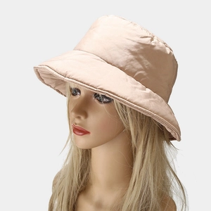 Minimalist light pink down-filled bucket hat with warm puffer design for winter fashion