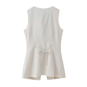 Detail view of linen vest back featuring adjustable waist drawstring and slit