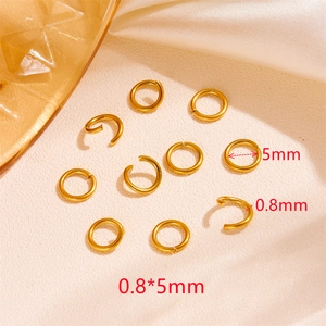 Detailed view of 5mm 18k gold plated lobster clasp rings with 0.8mm wire thickness