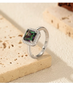 Macro detail of S925 sterling silver stamp and square rainbow crystal on the ring band