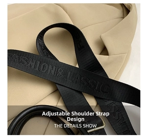 Detail of adjustable nylon strap with Fashion & Classic text and black leather handle
