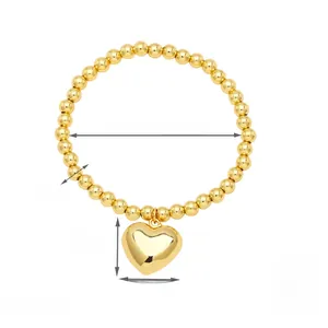 Detail view of 18k gold plated beaded heart bracelet with 5mm beads and 20mm pendant