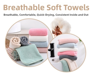 Detailed waffle texture of thick coral fleece towels with breathable and absorbent weave