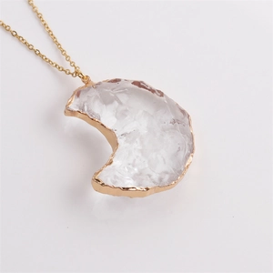 Irregular crystal moon pendant necklace with faceted heart and gold twisted chain jewelry