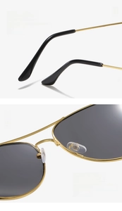 Detailed view of metal sunglasses temples with black tips and soft silicone nose pads