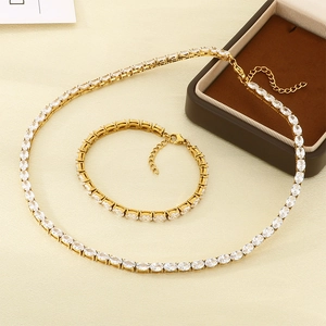 Ensemble élégant collier et bracelet tennis en acier doré avec zircons blancs ovales