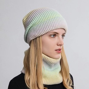 Winter knit set featuring a gradient macaron beanie and matching infinity scarf for women