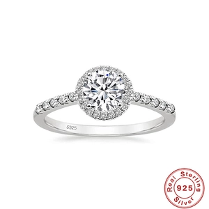 Detailed close-up of S925 sterling silver halo ring showing hallmark and sparkling round diamond
