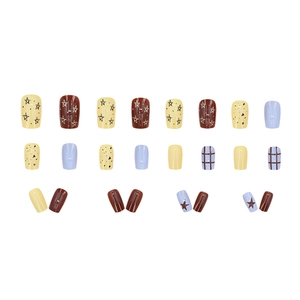 Press-on nail set with 24 pieces featuring star patterns and grid designs in blue and brown