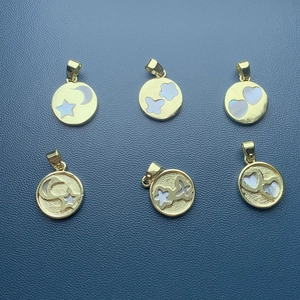 Golden round mother of pearl pendants with star moon heart and butterfly patterns