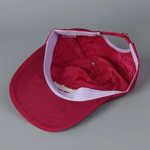 Quick-dry red baseball cap with embroidered letters and adjustable metal back buckle