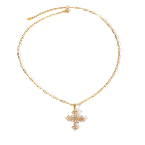 Detail of gold cross necklace with crystal inlay and adjustable chain on white background