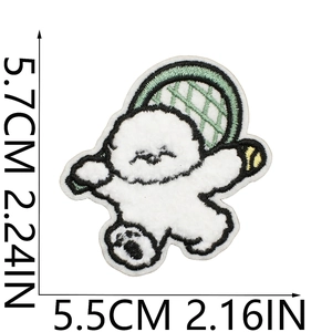 Detailed macro view of Bichon dog towel embroidery patch with tennis racket and dimensions