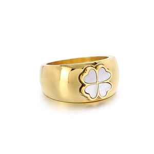 Golden 11mm wide stainless steel band ring featuring white shell clover inlay