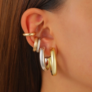 Ensemble de boucles d'oreilles vintage dorées et argentées avec anneaux texturés
