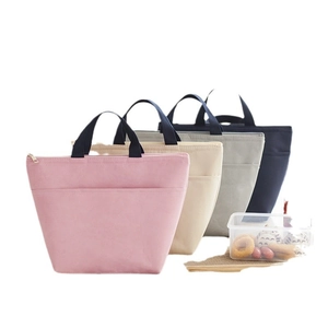 Insulated lunch bags in pink, beige, gray and blue with portable handles and zipper