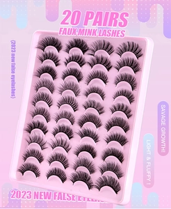 Gros plan de 20 paires de faux cils en vison synthétique, texture dense et volumineuse