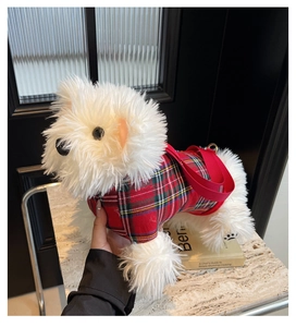 Close-up of fluffy white Westie dog plush crossbody bag with red tartan plaid outfit