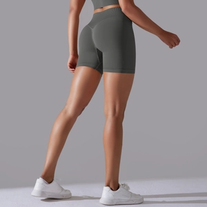 Detail of high-waist seamless dark grey yoga shorts with scrunch butt lift texture