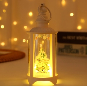 White LED Christmas lantern with Santa graphics and warm light on a cozy bokeh background