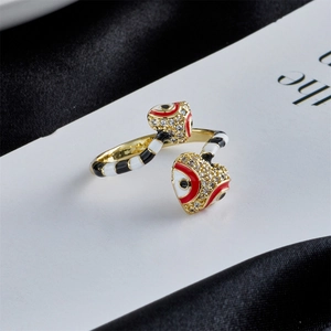Golden double-headed snake open ring with enamel eyes and cubic zirconia accents