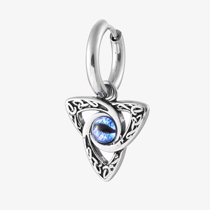 Close-up of 316L stainless steel moon earrings with blue evil eye and Celtic details