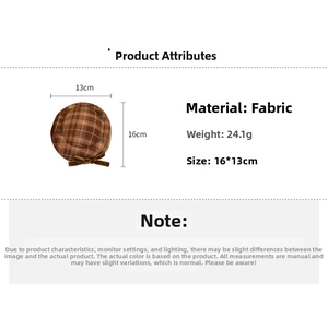 Detail view of leopard plaid fabric hair clip with a dark brown velvet bow and dimensions