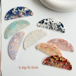 Mini acetate crescent hair combs in various marble and tortoiseshell patterns 8.5cm