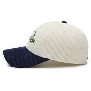 Vintage corduroy baseball cap in white and navy blue with WONDER embroidery
