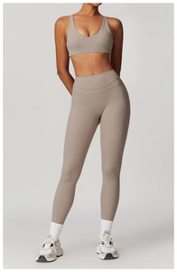 Detail of high-waisted taupe yoga set featuring high-stretch matte fabric for fitness