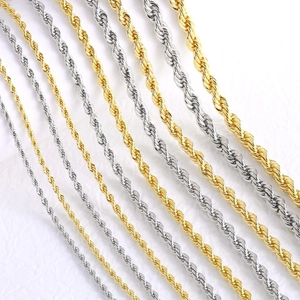 Detail of twisted rope chains in various thicknesses with gold and silver finishes