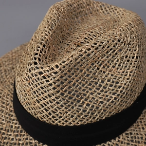 Flat top straw sun hat with breathable hollow weave and classic black ribbon band