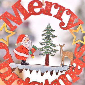 Red wooden hollow Christmas ornament with Merry Christmas text and Santa Claus