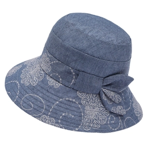 Women's blue sun hat with floral embroidery and bow detail for summer and spring