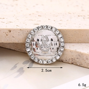 Detail view of a 25mm silver anchor button with rhinestones for DIY shoe charms