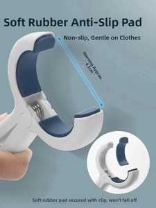 Detail of strong plastic laundry clip with 4.5cm wide opening and blue anti-slip soft pads