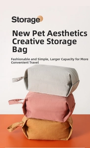 Three waterproof nylon storage bags in grey, rose pink, and yellow with side handles