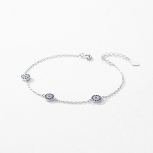 Elegant S925 sterling silver evil eye bracelet with blue and clear crystal charms