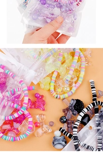 Detail showing colorful polymer clay heishi beads and acrylic butterfly DIY materials kit