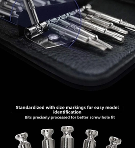 Macro view of precision replacement screwdriver bits arranged in a black leather wallet case