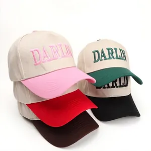 Embroidered cotton baseball caps in five contrast colors featuring DARLIN lettering