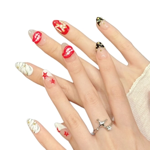 Press-on nails featuring red lip textures and gold studs with a decorative ring