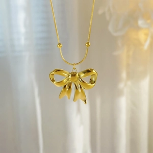18K gold plated titanium steel necklace featuring a delicate 3D bow pendant and fine chain