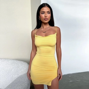 Detailed side view of yellow strapless dress showing thin straps and high side slit