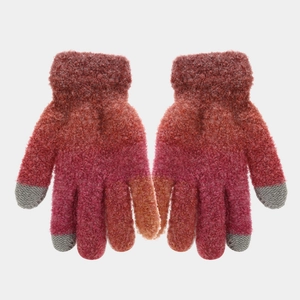 Detail of colorful gradient knit gloves with thick warm texture and grey fingertips