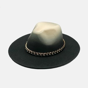 Gradient black and white wool felt fedora hat with a bold gold chain band accessory