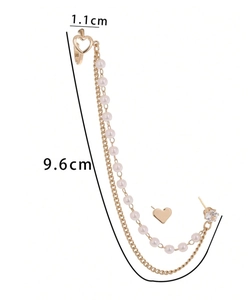 Detail of heart stud earring with 9.6cm double pearl chain tassel and zircon charms