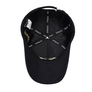 Interior detail of large head size black baseball cap with reinforced inner seams and labels