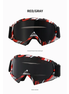 Detail view of red and gray honeycomb patterned ski goggles with dark mirror lens