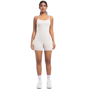 Front view of a slim-fit cream yoga bodysuit with a minimalist sleeveless design